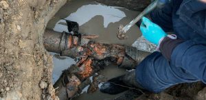 Drain repairs in Southsea Portsmouth showing damaged underground pipework being repaired outside a residential property